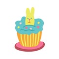 Easter cupcake decorated with a rabbit biscuit.